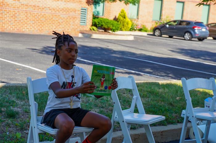 A book reading during the AIU Back-to-School Celebration